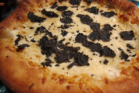 Shaved Truffle as a Topping on a Pizza